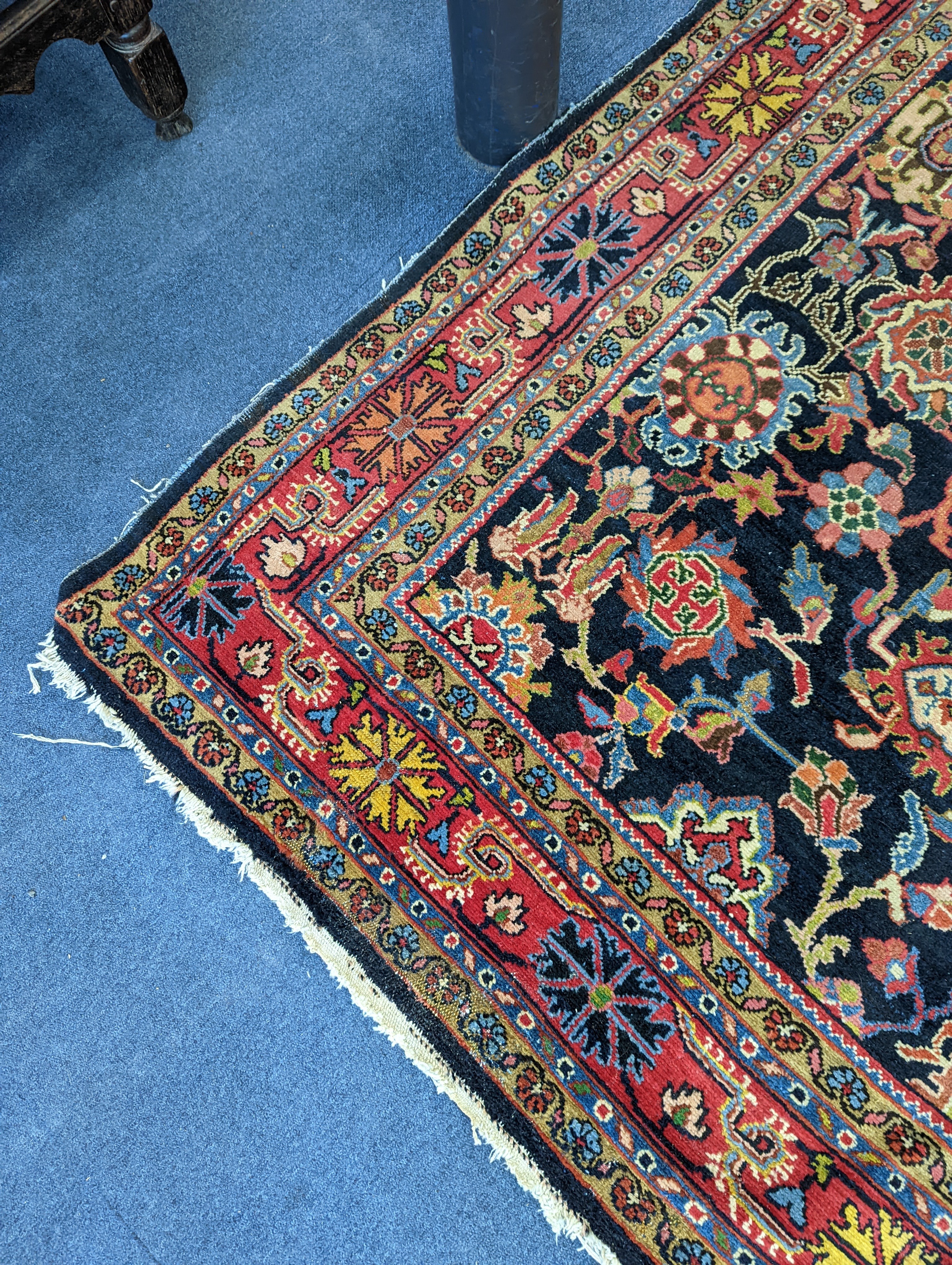 A Heriz / Moghal blue ground carpet, 340 x 206cm
